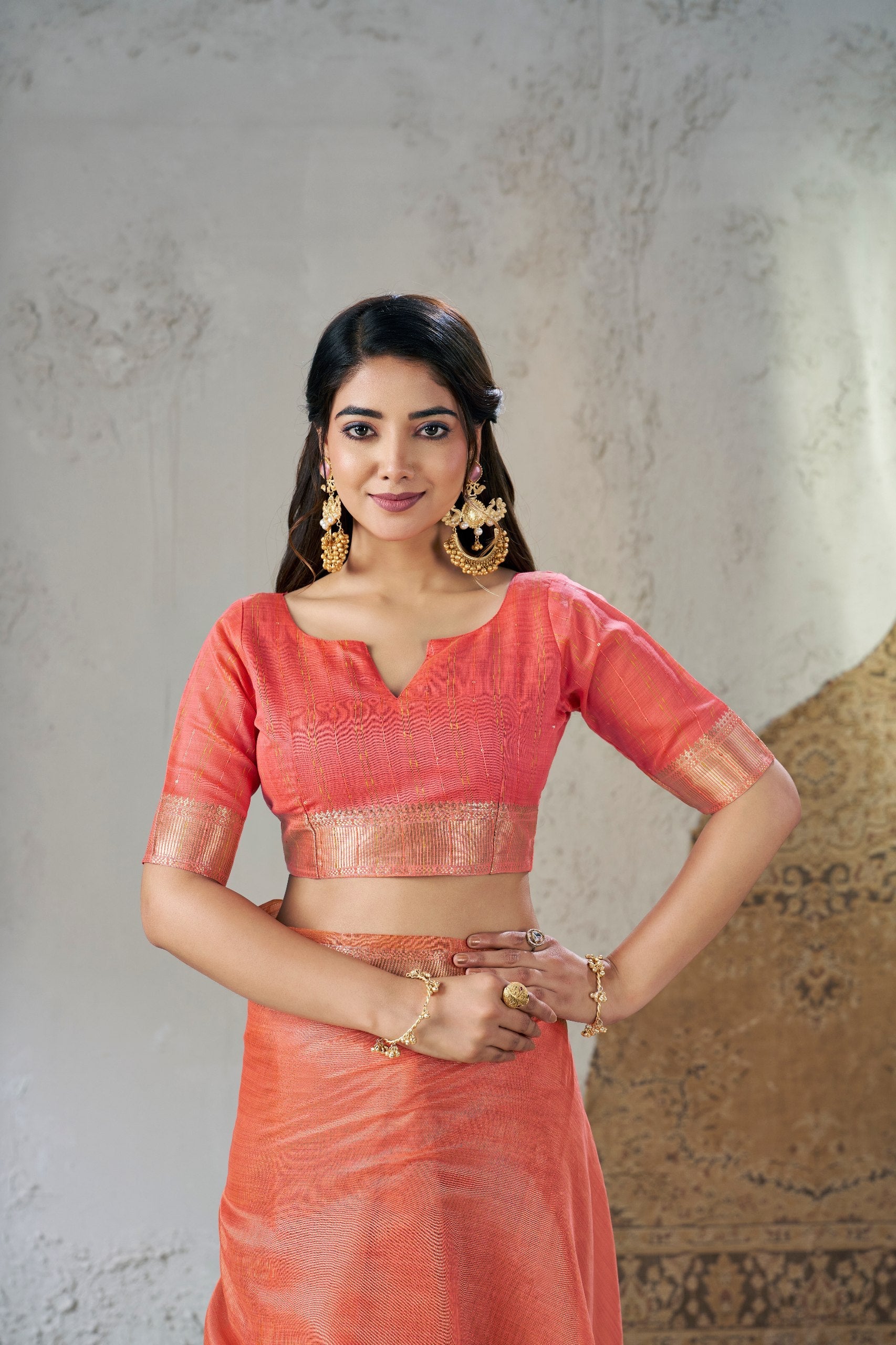 Sunset Peach Banarasi Silk Saree with Golden Zari Border